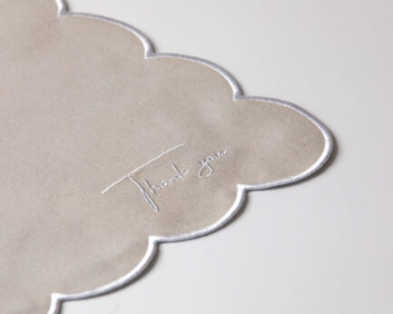 Grey Napkin With White Embroidery